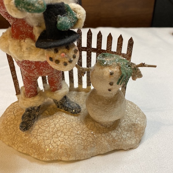 Andy Faye. Santa builds snowman. - Picture 3 of 10